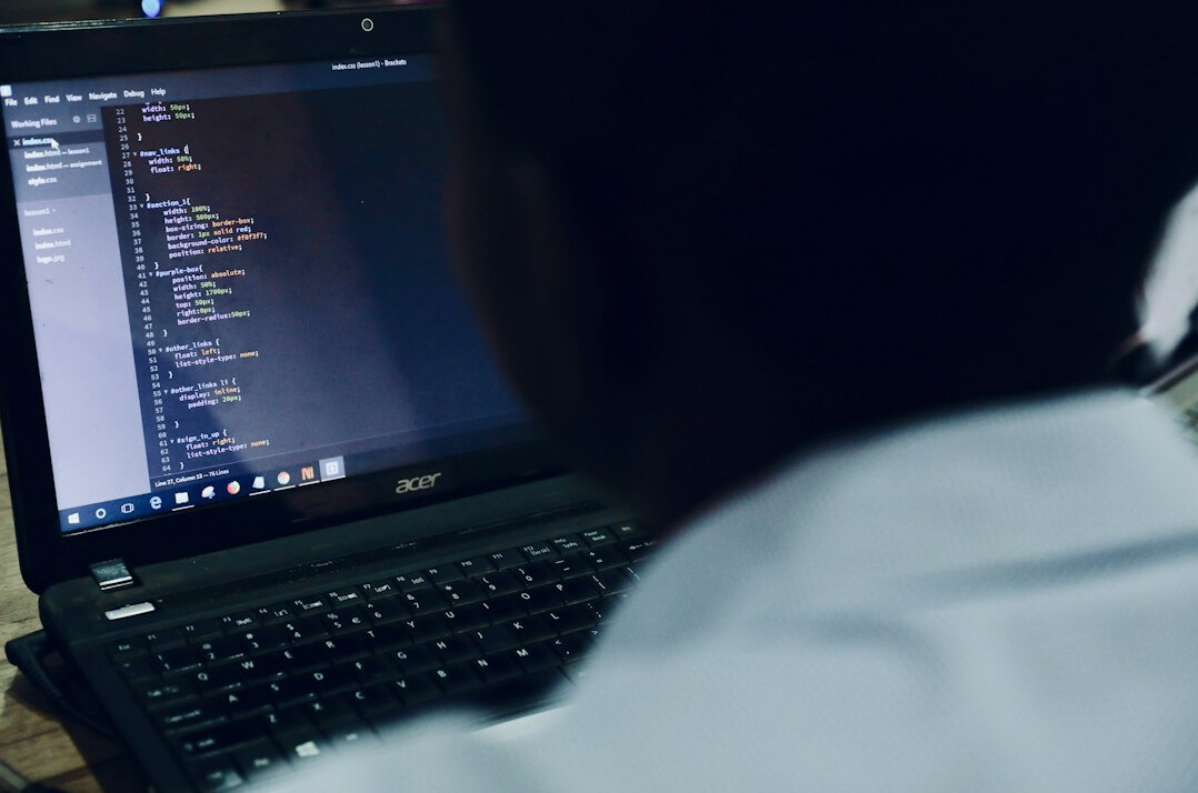 person learning coding on laptop