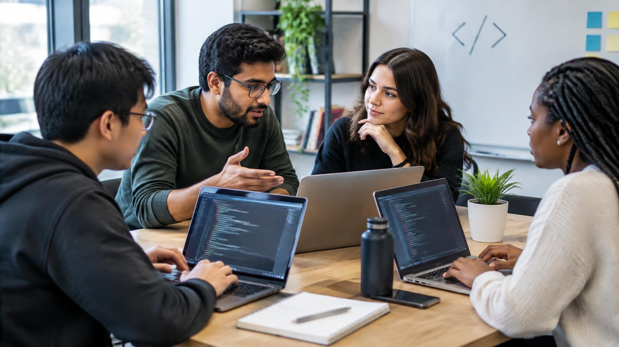 group of programmers discussing